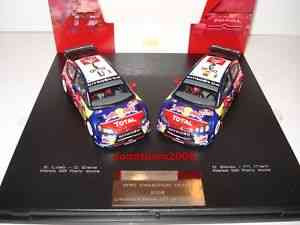 IXO-MODELS - CITROEN - SET 2X C4 WRC RED BULL CHAMPION 2008 RALLY WALES GB N 1 S.LOEB - D.ELENA - N 2 D.SORDO - M.MARTI. Scale: 1/43 .RAM350